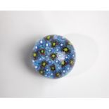 Paperweight Murano, 20th century Millefioricanes laid on colorless upholstery. 7x6cm.