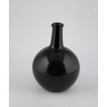 Large spherical bottle, 19th century, strong manganese glass. Slightly pricked soil with sand