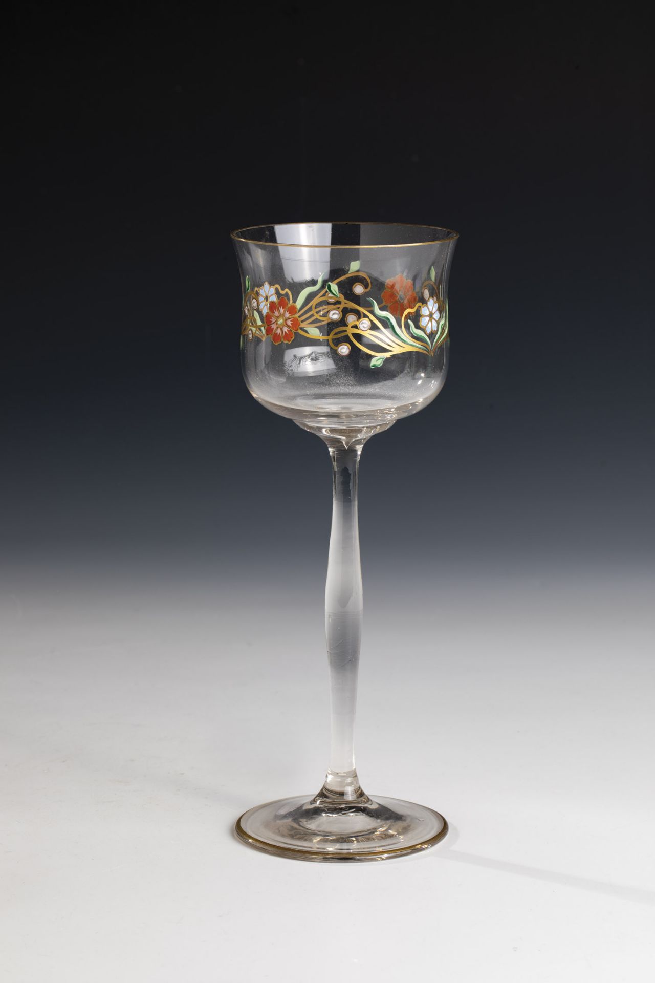 Stem glass Bohemia, ca. 1900 Colourless, optically blown glass with multi-coloured transparent and