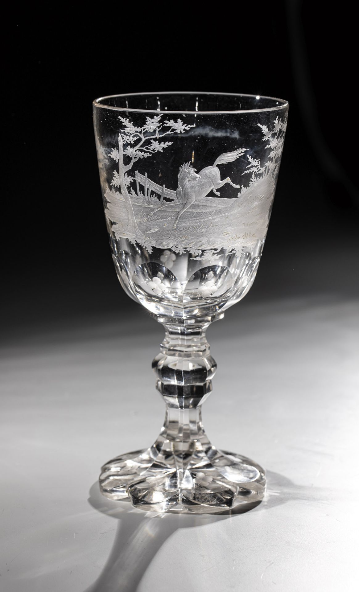 Goblet with horse North Bohemia or Silesia, 2nd half of the 19th century Colourless glass. Fittingly