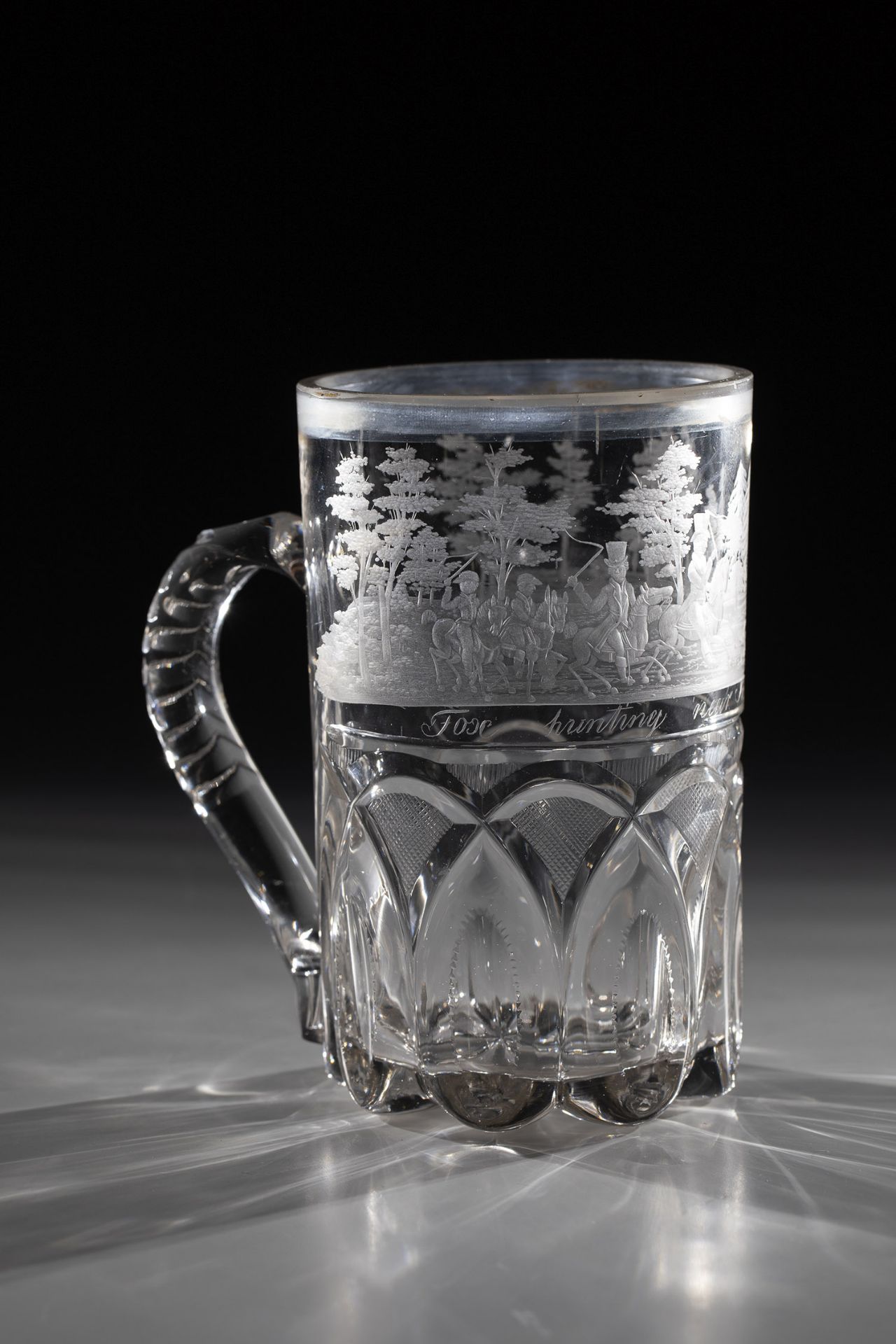 Mug with parforce hunting England, M. 19th century Colourless glass. Stand with roller, lens and