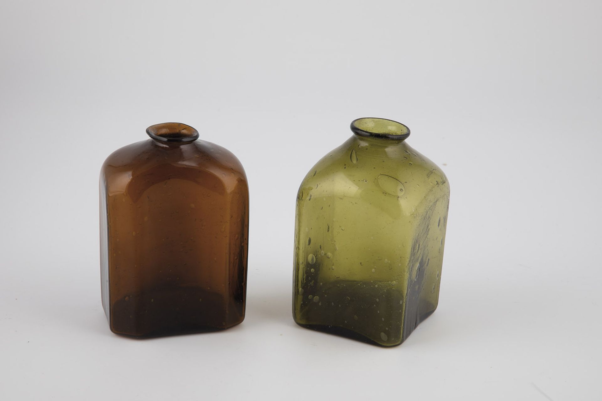 Two square bottles Alpine, 18th/19th century Brown and green glass, rectangular and square with