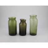 Three storage vessels France, 19th century Olive-green glass with tear-off, partly raised bottom.