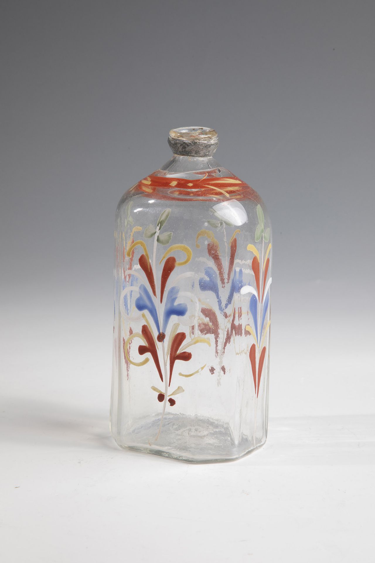 Schnapps bottle with tin mount Probably Black Forest, 18th century Colourless glass with tear. On