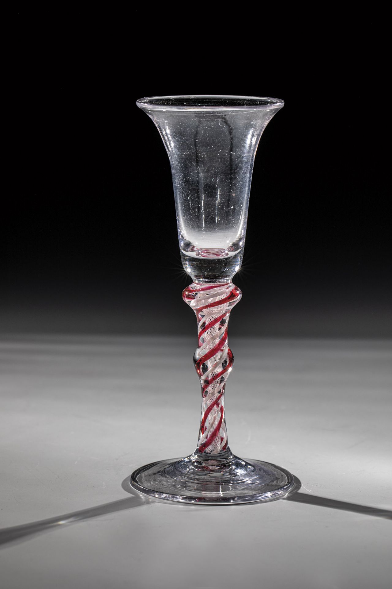 Thread glass, Netherlands, 17th century, disc base with tear. Shaft with two nodes as well as