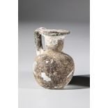 Small jug Eastern Mediterranean, 2nd-4th century A.D. Greenish glass. Ball belly, neck