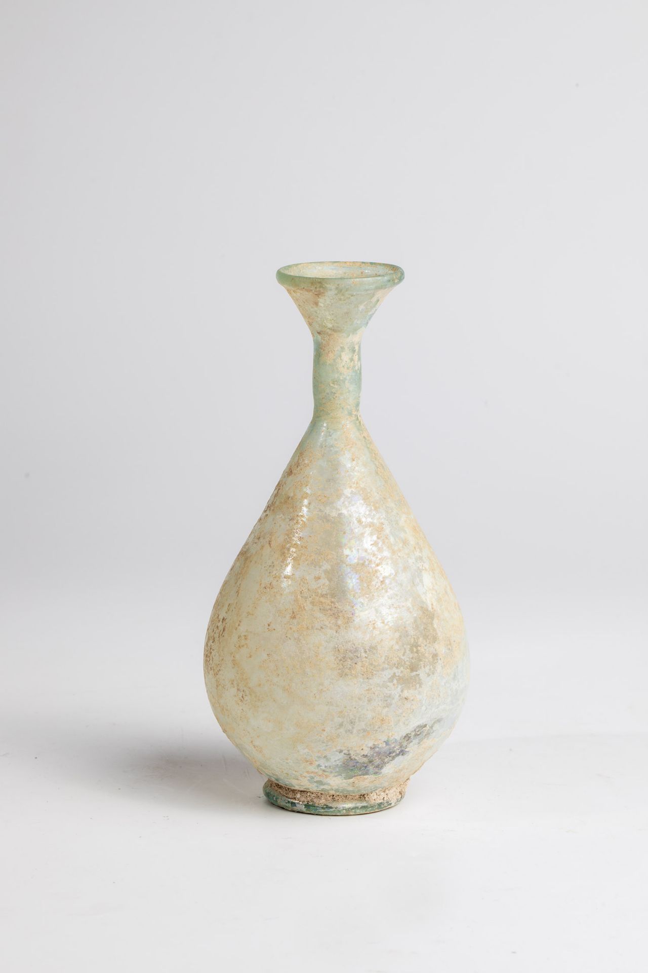 Bottle Middle East, 2nd-4th century AD Bottom find. Light green glass. Teardrop-shaped wall on