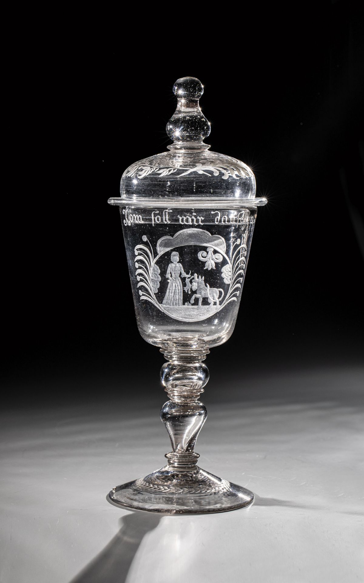 Erotica Lidded goblet Bohemia, 18th century Grey-tinted glass with tear-off. Slightly rising disc