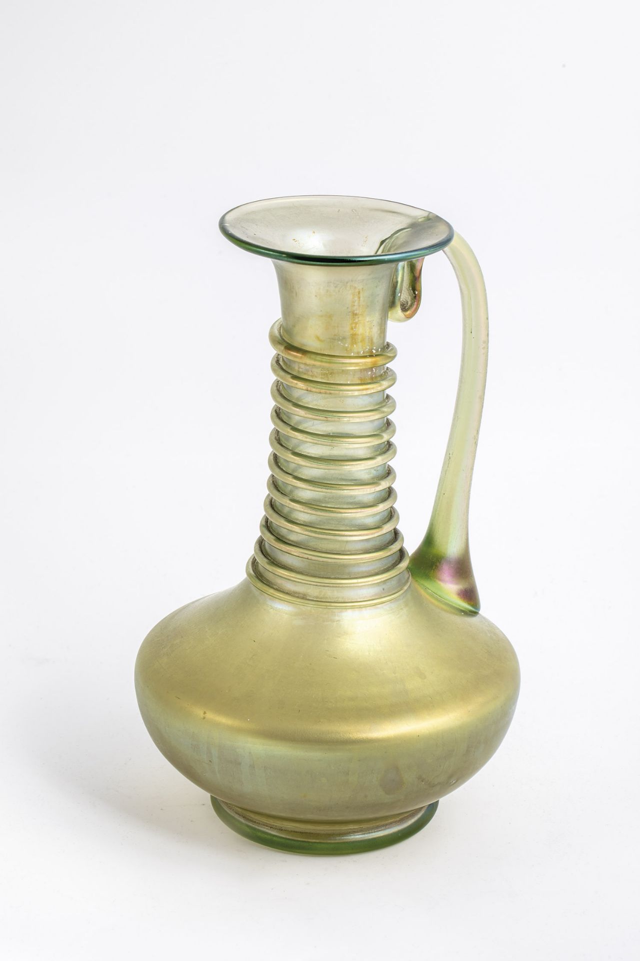 Jug ''Olympia smooth'' Loetz Wwe., Klostermuehle, around 1900 Light green glass, optically blown.