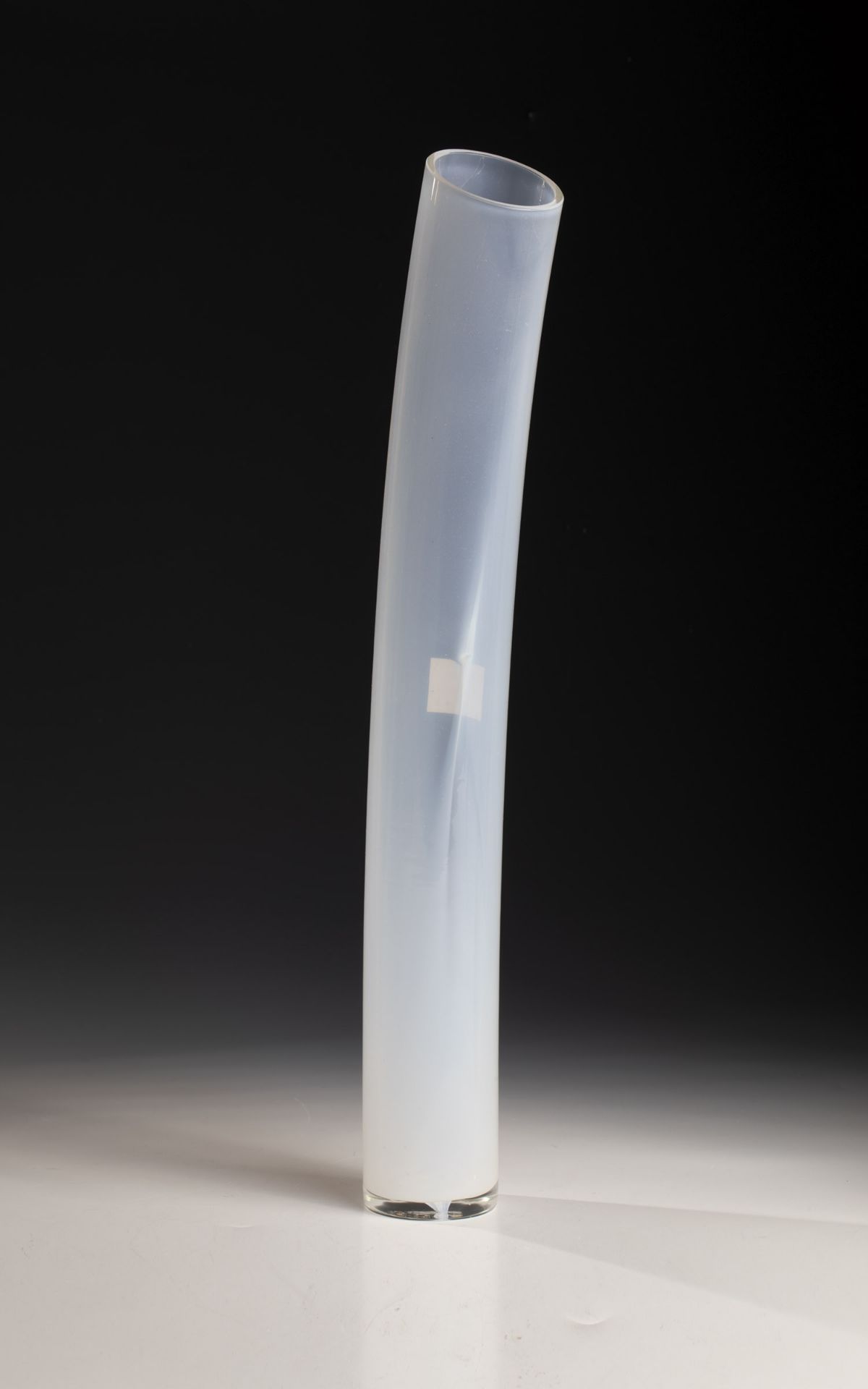 Slender vase Murano, 2003 Colorless glass, white opalescent underlay. Sleek, curved C-shape.
