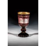 Goblet with a view of Karlsbrunn Bohemia, m. 19th century Colourless, red glazed glass with floral