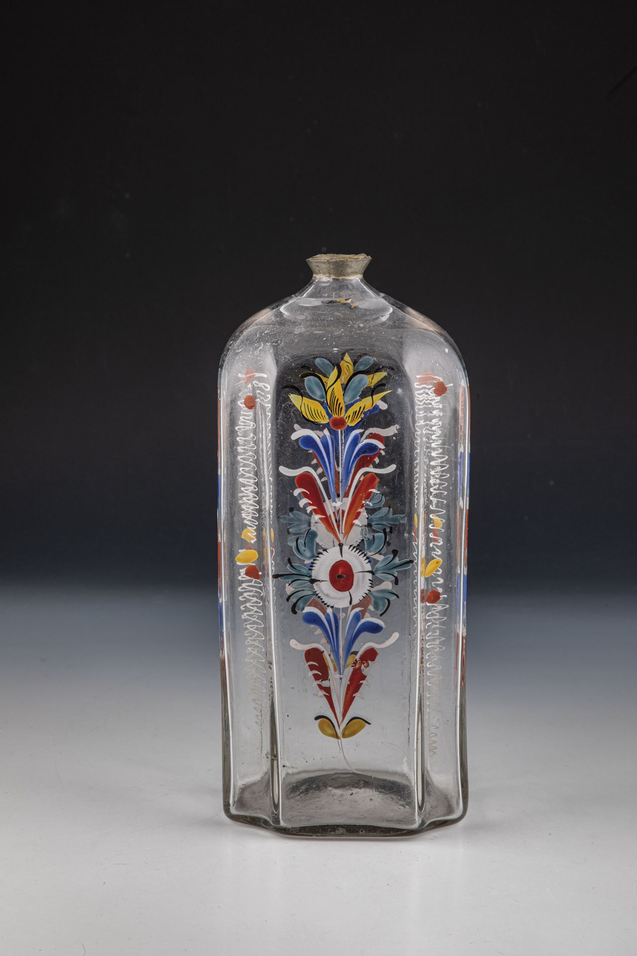 Rare, large liquor bottle with tin mount Germany, 18th century Colourless glass with tear-off. On