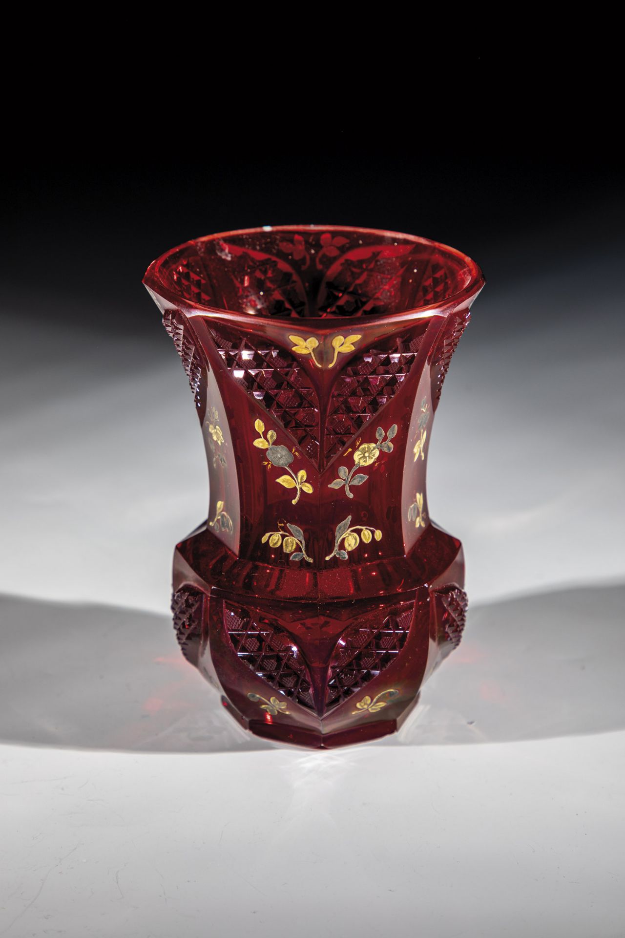 Mug Bohemia, 19th century Colourless red glazed glass. Stand with notched edge. Eightfold faceted