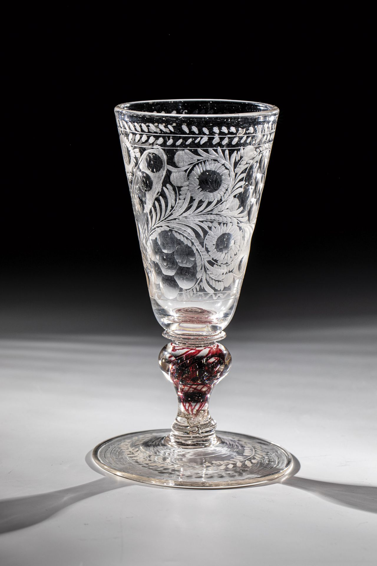 Goblet with gold ruby threads Bohemia around 1740 Colourless glass with tear. Disc base with cut