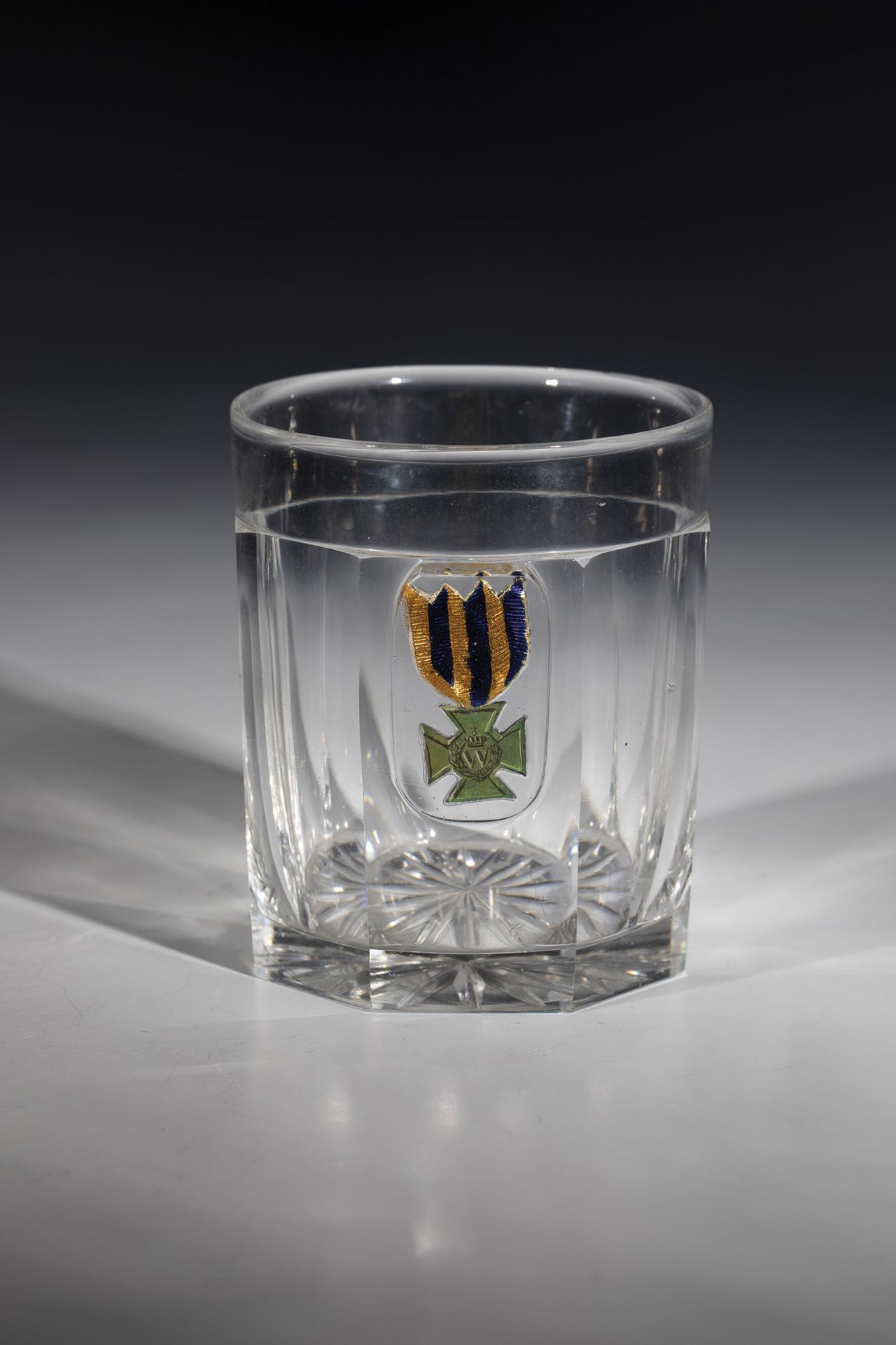 Mug with enclosed Iron Cross France or Belgium around 1914 Colourless glass with notched star in the