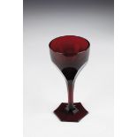 Goblet glass at the end of the 19th century Ruby-coloured copper glass in the mass. Hexagonal base