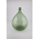 Large storage bottle Italy, 19th century Green glass. Slightly pricked bottom. Below the sharp-edged