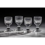Set of four sweet wine glasses 19th century Colourless glass with tear-off. Coupling attachment with
