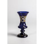 Small vase, 19th century, cobalt blue glass with demolition. Floral decor in white, yellow enamel