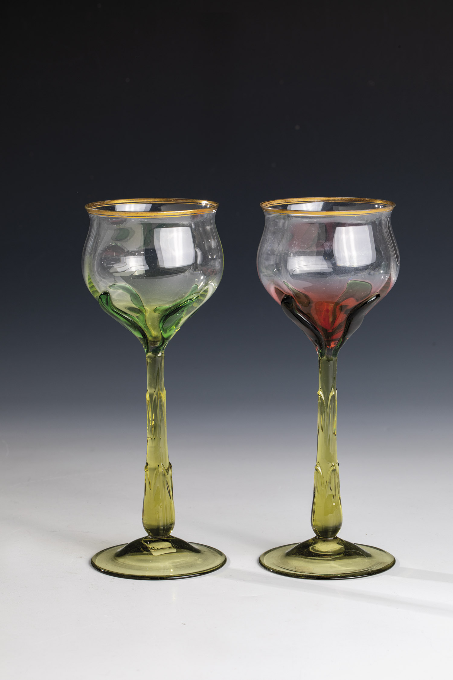 Two stem glasses probably Graeflich Harrachsche Glasfabrik, New World, around 1900 feet and stems