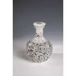 Carafe with stopper Bohemia, M. 19th century White alabaster glass. Stand with roller grinding.