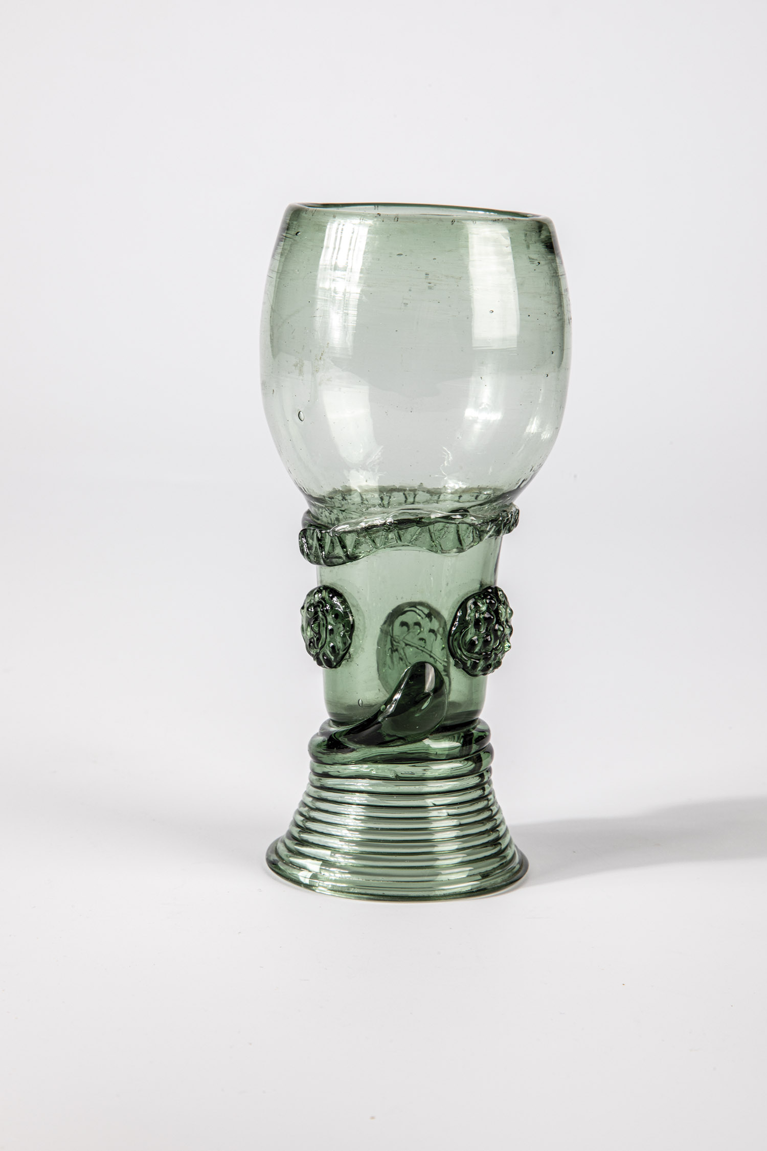 Roman German, 17th century Light green glass with spun base, high bottom, on the upper open shaft