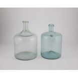 Two storage bottles of Austria, 19th century Light green glass with a raised bottom and tear-off. On