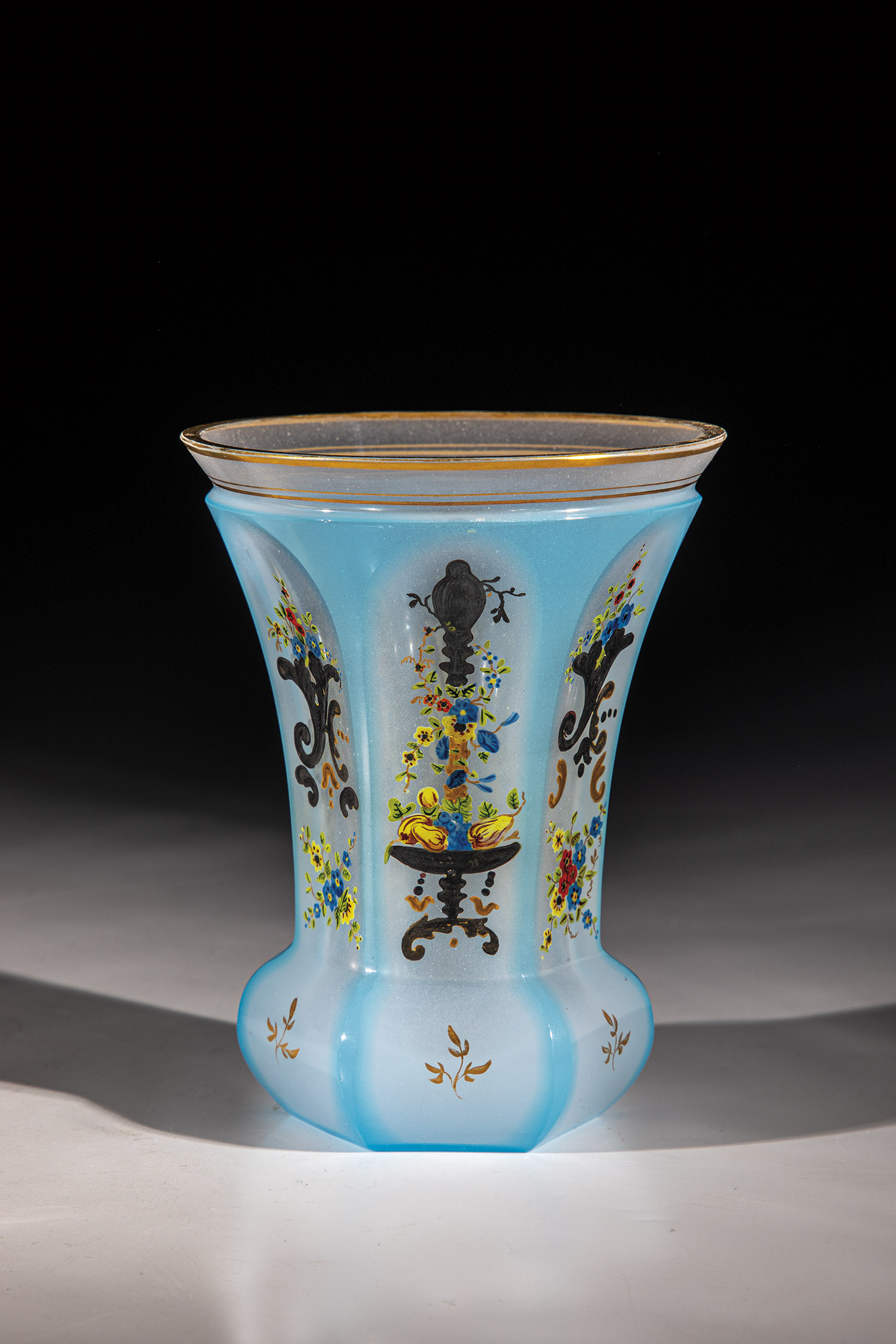 Alabaster cup Bohemia, ca. 1840 White alabaster cup with light blue overlay, six peeled tongues with