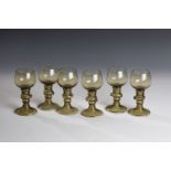 Set of six Romans German, 19th century Olive green glass with ribbed trumpet base. Hollow shaft with