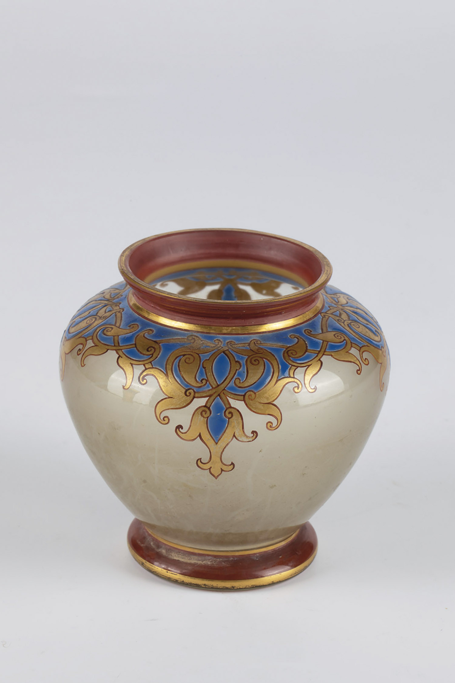 Small vase Bohemia, ca. 1900 Colourless glass with coloured opaque enamel and gold. Decorated with