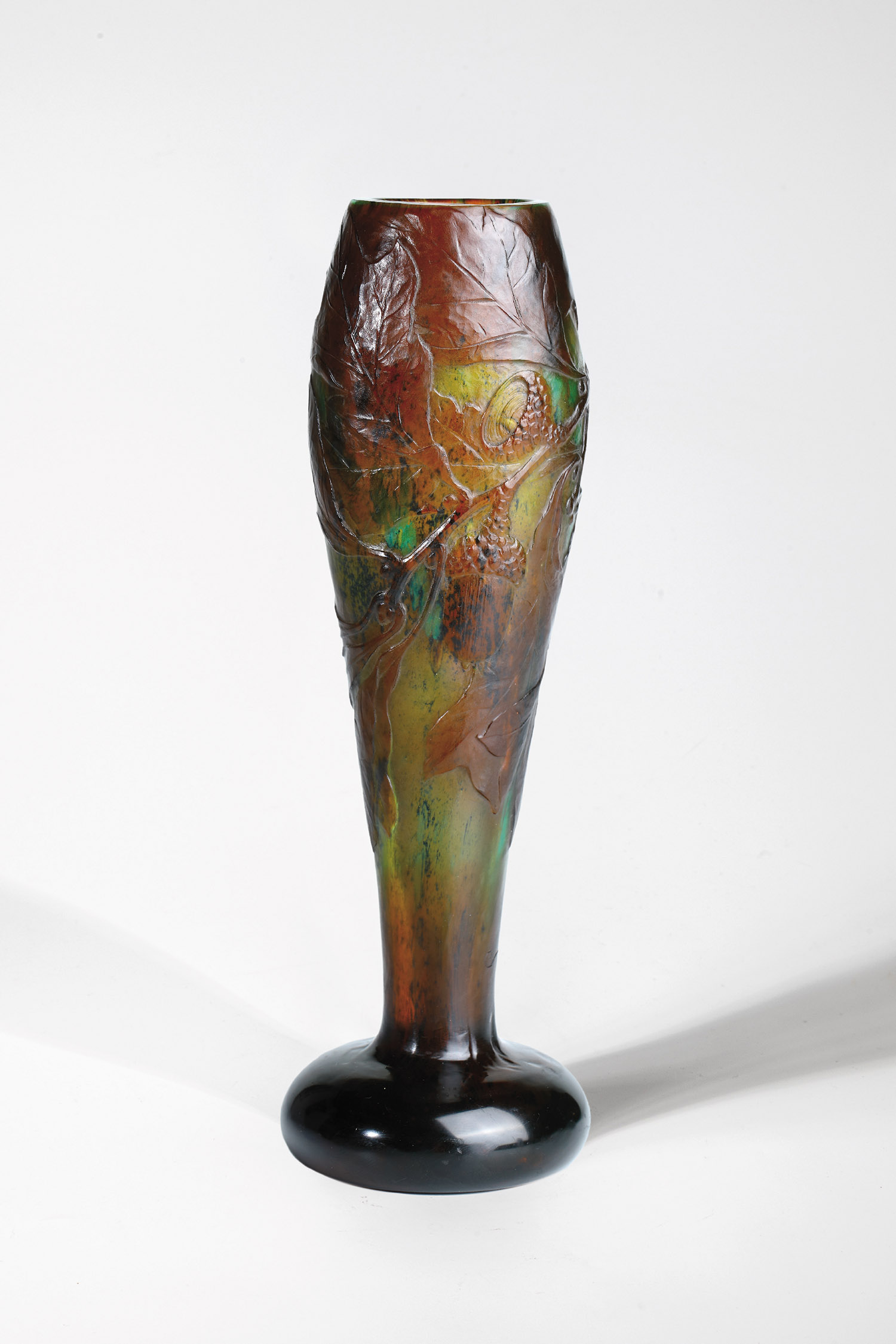 Rare and important vase with oak leaves Emile Galle, Nancy, 1896 Colourless glass with green-