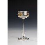 Stem glass Bohemia, ca. 1930 Colourless glass. With yellow stain and cut. Decor: Floral