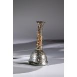 Bottle Middle East, 3rd-4th century A.D. Light green glass. Bell-shaped wall. Muzzle with upturned