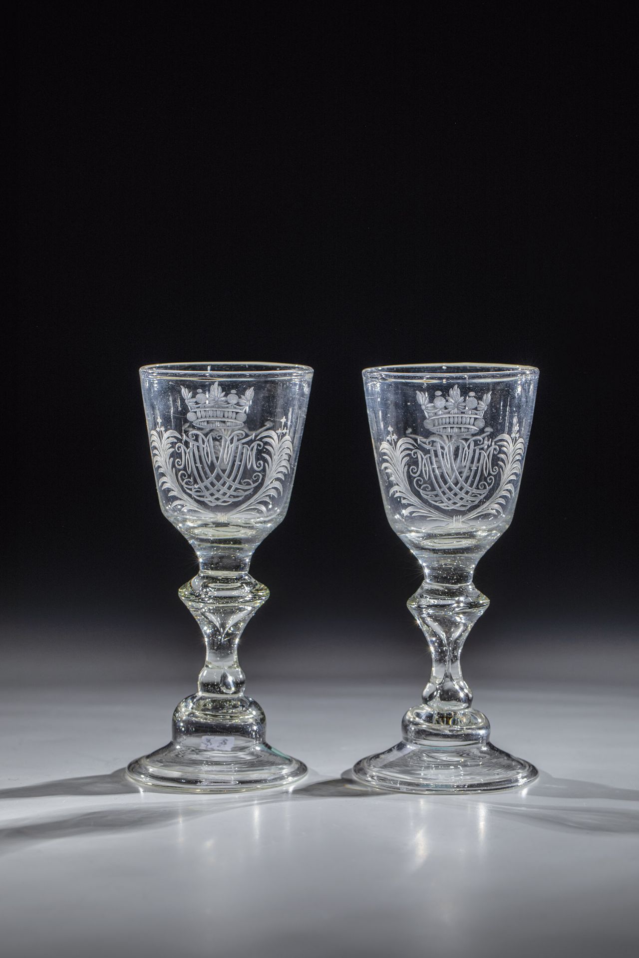 Pair of goblet glasses with monogram Middle German, 18th century, cone base with tear and downward