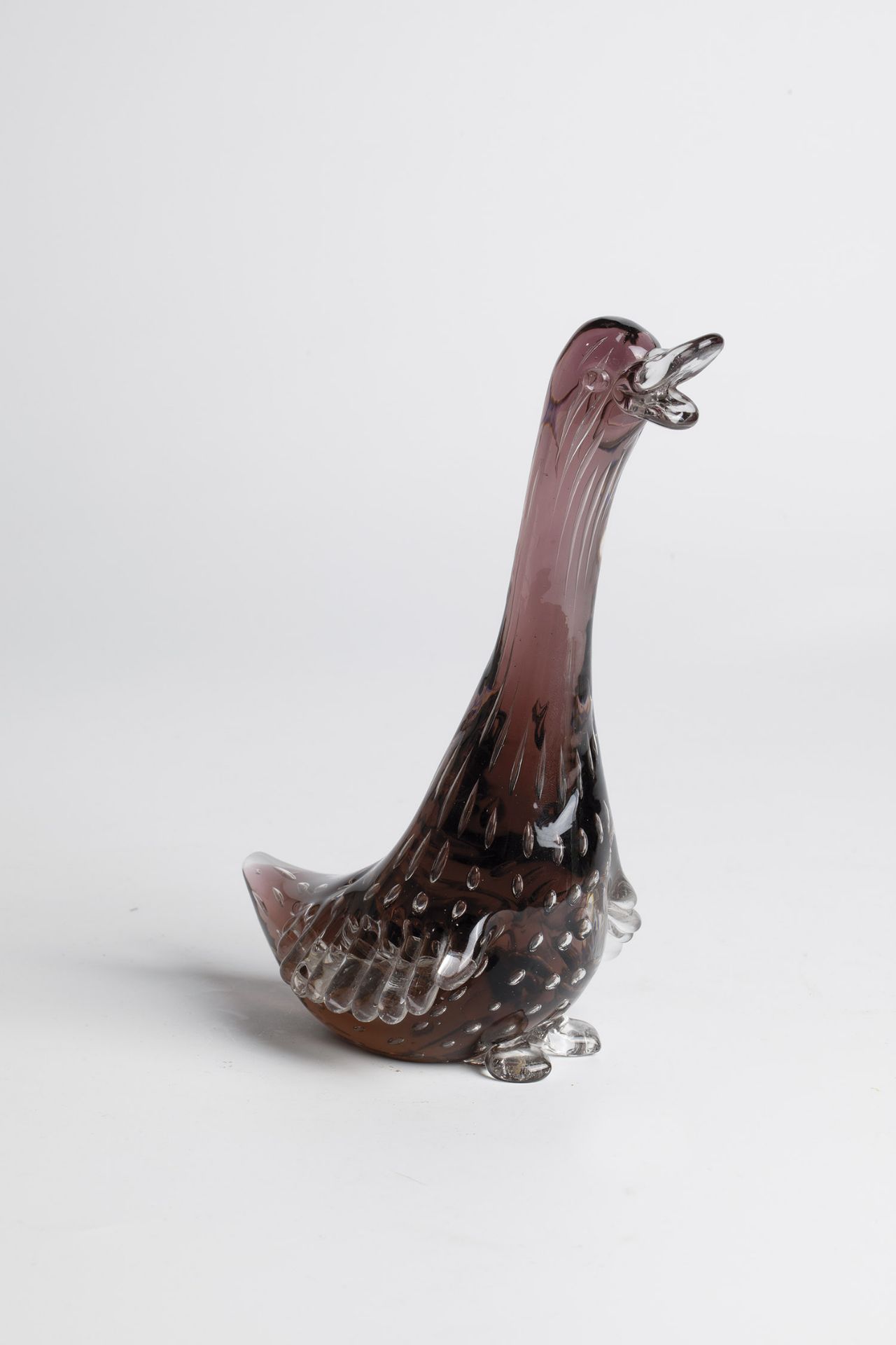 Stylized Duck Venini, Murano, ca. 1950 Colourless, violet underlaid glass, with pierced air beads.