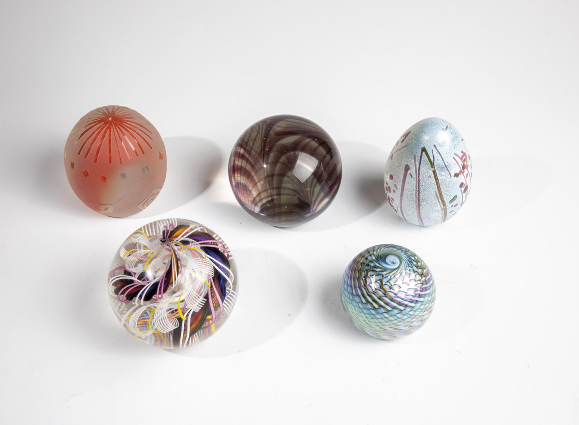 Five paperweights, 20th century, mixed lot of five paperweights made of glass. One signed ''Waller