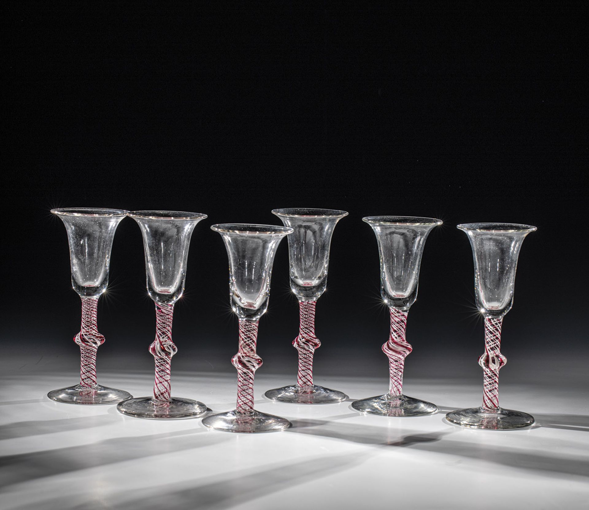Set of six thread glasses LiÃ¨ge, 17th century. Shaft with nodes as well as spirally incorporated