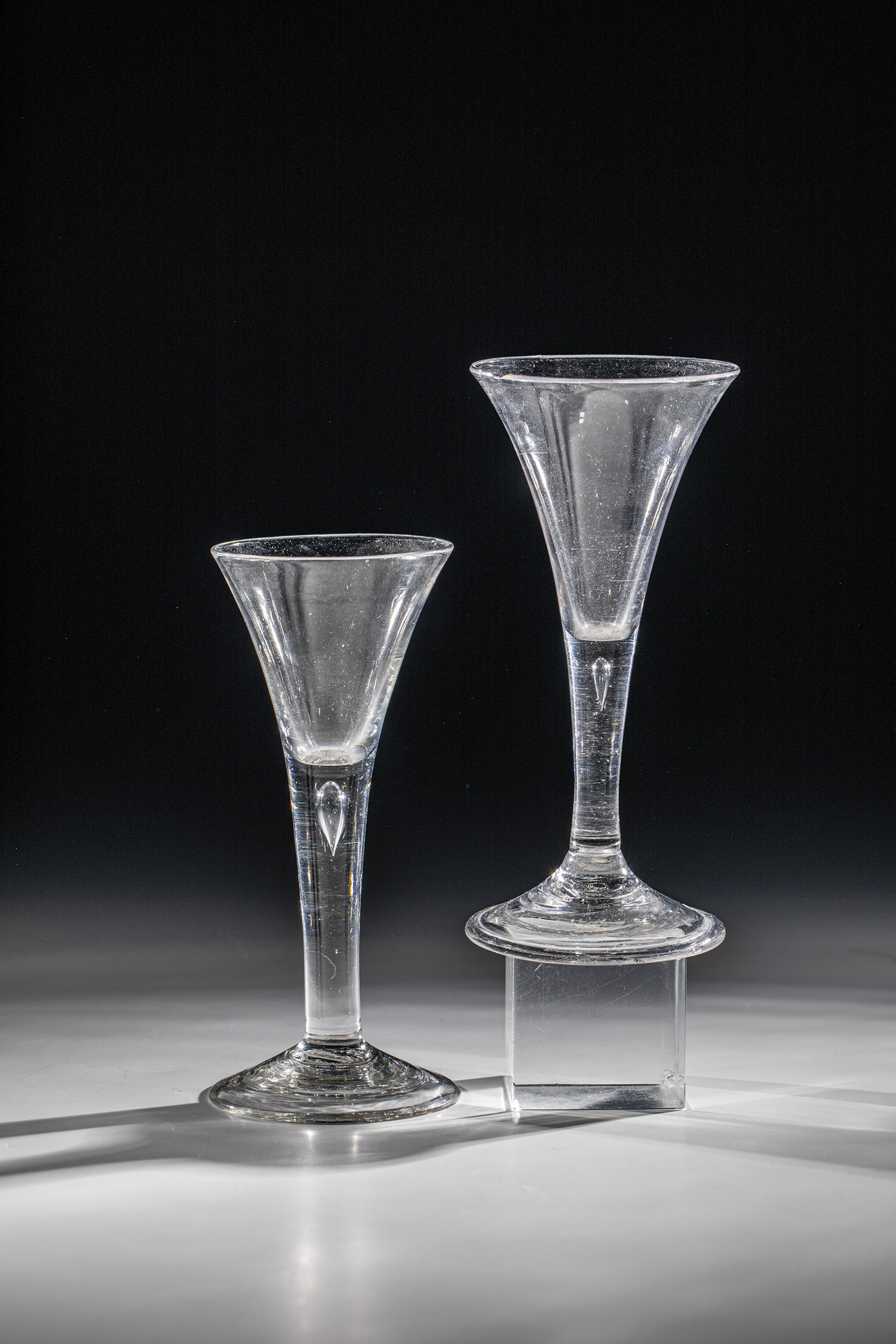 Two pointed goblets from Central Germany or England, mid-18th century, disc base with tear-off,