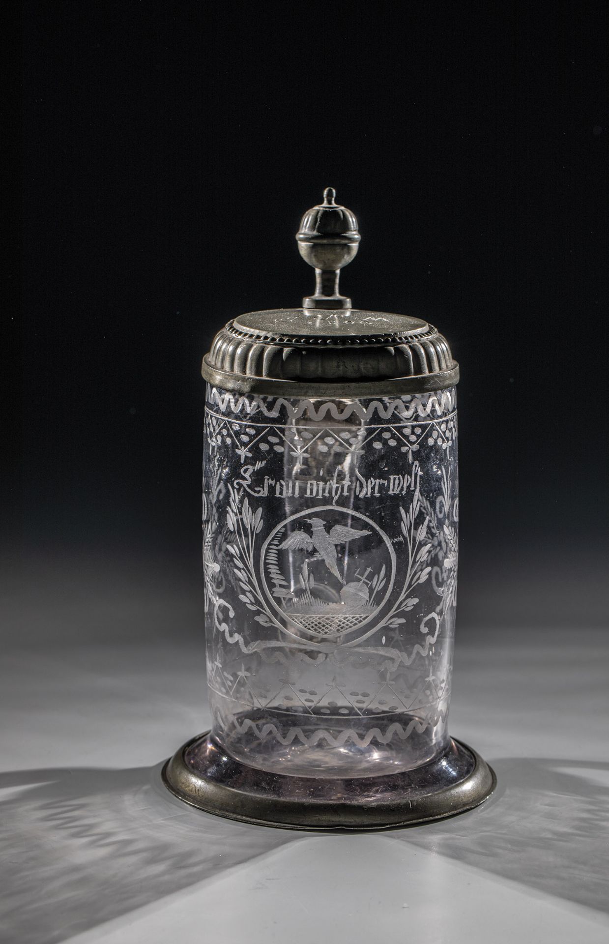 Jug with tin lid Saxony, early 18th century Colourless, slightly manganese-tinged glass with tear.