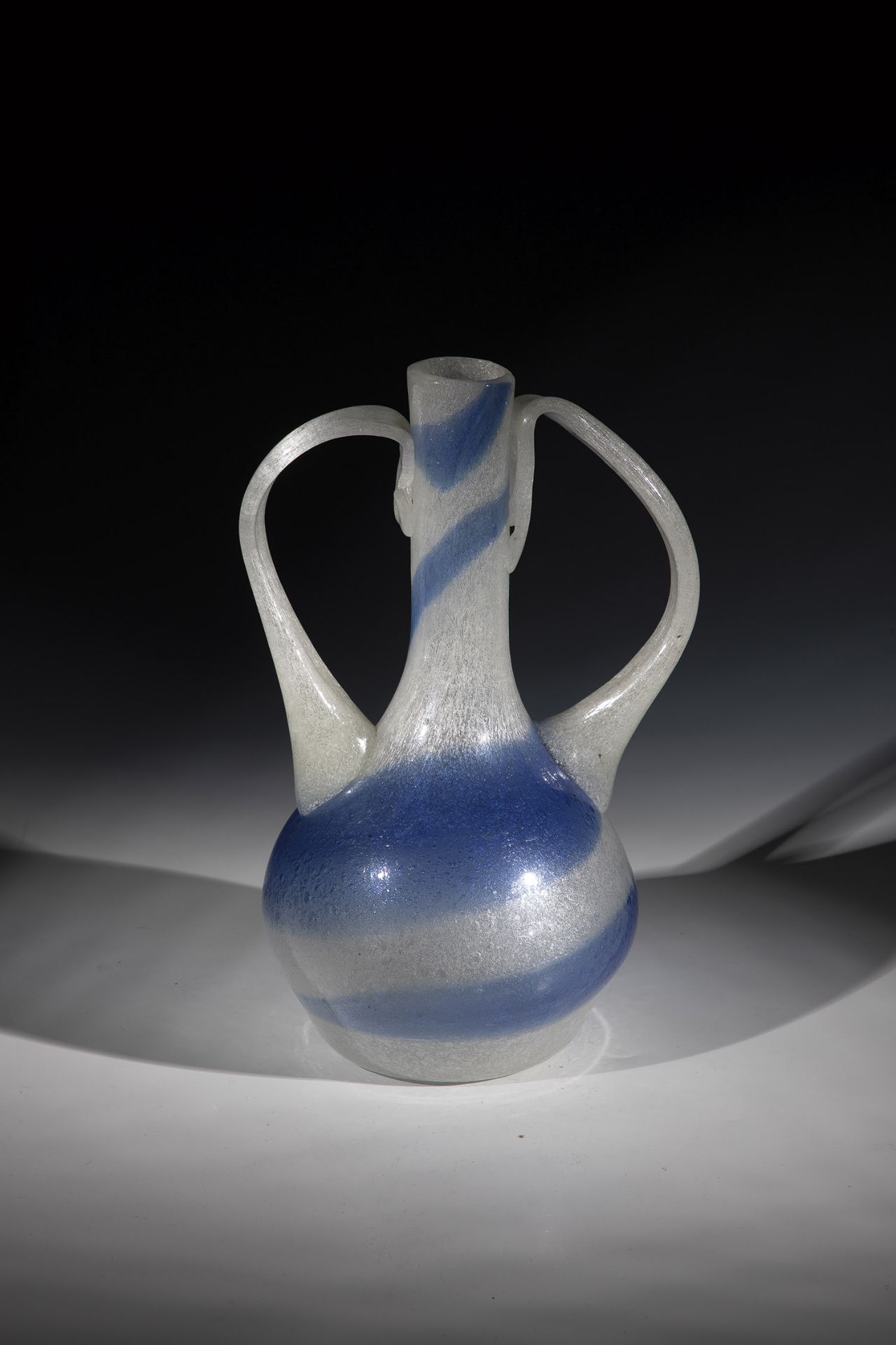 Handle vase ''Pulegoso'' Murano, 1960s Colourless, strongly bubbled glass ('Pulegoso') with spiral