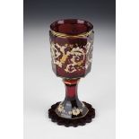 Cup Bohemia, ca. 1850 Red glazed glass. Base with roller grind and passingly ground edge. Faceted