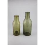 Two storage vessels France, 19th century Green and olive green glass with raised bottom and