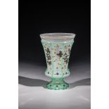 Foot cup Bohemia, ca. 1835 White alabaster glass with turquoise uranium-containing case. Bottom with