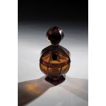 Lidded box Wohl, Moser, Karlovy Vary, 1920 Amber glass with peel cut. On the lid with label