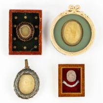 Four antique 'Agnus Dei' wax seals in frames. 19th C. and older. (W:18 x H:20 cm)