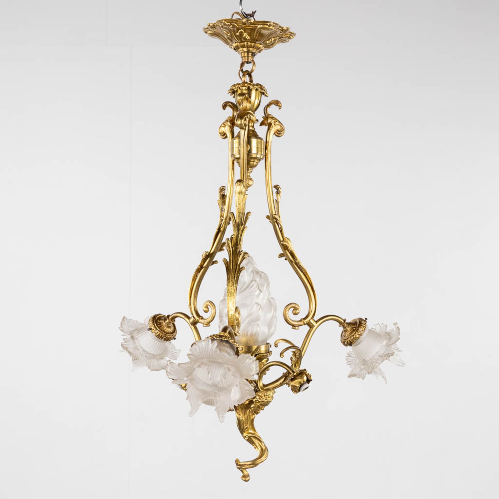 A chandelier, bronze with glass shades and a flambeau, decorated with Satyr figurines. (H:88 x D:54 - Image 3 of 13