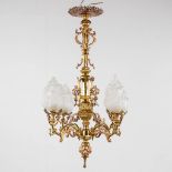 Luppens, a two-tone chandelier, bronze and copper mounted with glass shades. 19th C. (H:90 x D:55 cm