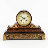 A mantle clock, Boulle mounted with gilt bronze. Napoleon 3, 19th C. (L:23 x W:33 x H:13 cm)