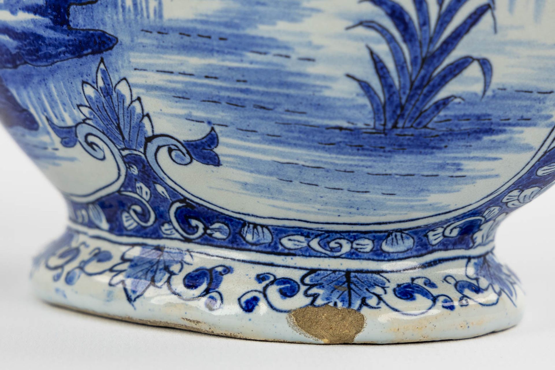Geertrui Verstelle, Delft, a pair of vases with a landscape decor. Mid 18th C. (L:9 x W:14 x H:26,5 - Image 10 of 15