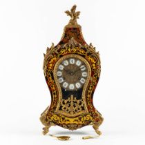 A mantle cartel clock, mounted with bronze in Napoleon 3 style, circa 1970. (L:12 x W:23 x H:47 cm)